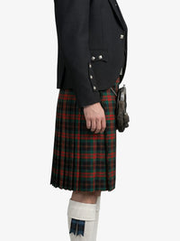 Person wearing a black jacket and red plaid kilt on a white background