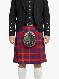 Person wearing a red tartan kilt with a black jacket on a white background