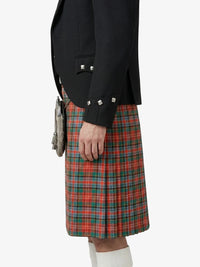 Person wearing a black jacket and red plaid kilt on a white background