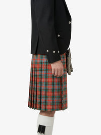 Person wearing a black jacket and red plaid kilt on a white background