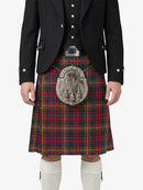 Person wearing a traditional Scottish kilt with a tartan pattern on a white background