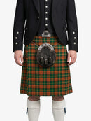 Person wearing a traditional Scottish kilt with a sporran on a white background