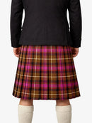 Person wearing a black jacket and plaid kilt on a white background
