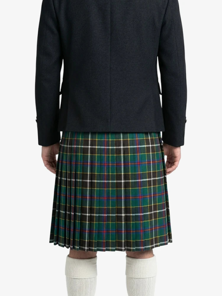 Person wearing a black coat and plaid kilt on a white background
