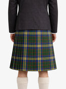 Person wearing a dark gray jacket and plaid kilt on a white background