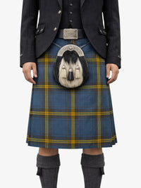 Person wearing a blue and yellow plaid kilt with a dark jacket and gray knee-high socks on a white background