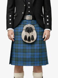 Person wearing a traditional Scottish kilt with a jacket and sporran on a white background