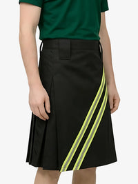 Black skirt with yellow stripes worn by a person on a white background