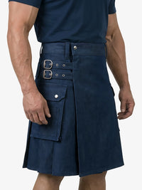Navy blue kilt with silver buckles worn by a person on a white background