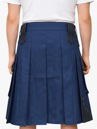 Blue pleated skirt with black accents worn by a person on a white background