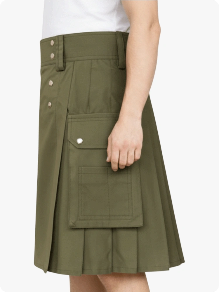 Person wearing a green kilt on a white background 