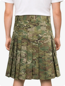 Camouflage pleated skirt worn by a person on a white background