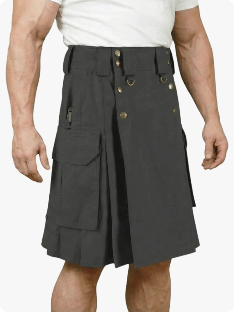 Person wearing a black kilt with gold buttons on a white background