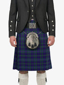 Person wearing a traditional Scottish kilt with a tartan pattern on a white background