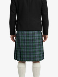Person wearing a black jacket and green plaid kilt on a white background