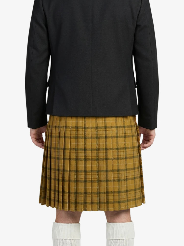 Person wearing a black coat and yellow plaid kilt on a white background