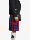 Person wearing a black jacket and red plaid kilt on a white background