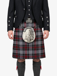 Person wearing a traditional Scottish kilt with a sporran on a white background