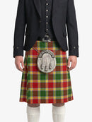 Person wearing a traditional Scottish kilt with a tartan pattern on a white background