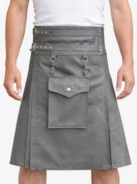 Gray kilt with metal accents worn by a person on a white background