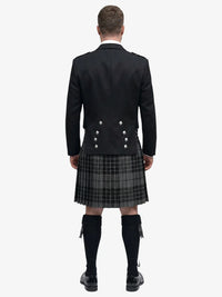 Person wearing a Highland grey watch tartan kilt and a black prince charlie jacket with a white background