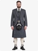 Man wearing a traditional Scottish kilt with a gray jacket and white shirt on a white background