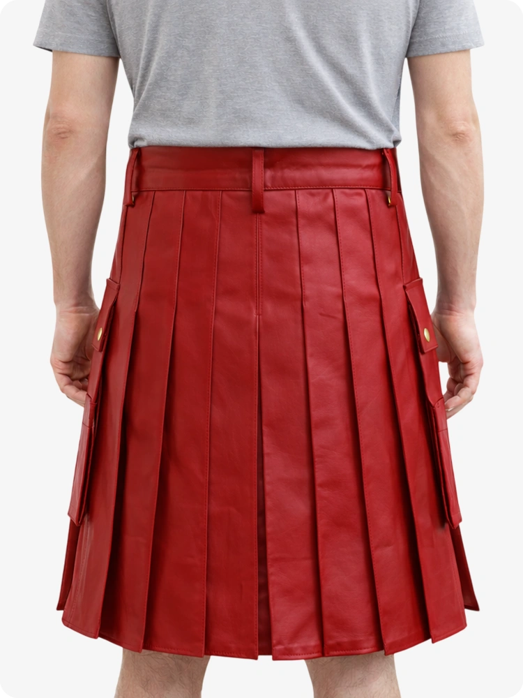 Red pleated skirt worn by a person on a white background