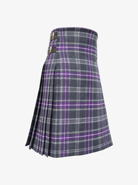 Plaid kilt with purple accents on a white background