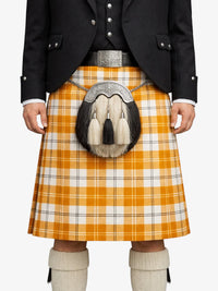 Person wearing a traditional Scottish kilt with a plaid pattern on a white background