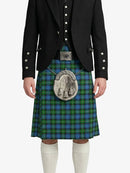 Person wearing a traditional Scottish kilt with a jacket on a white background