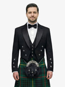 Man wearing a formal black prince charlie jacket tuxedo with a hunting stewart tartan kilt on a white background
