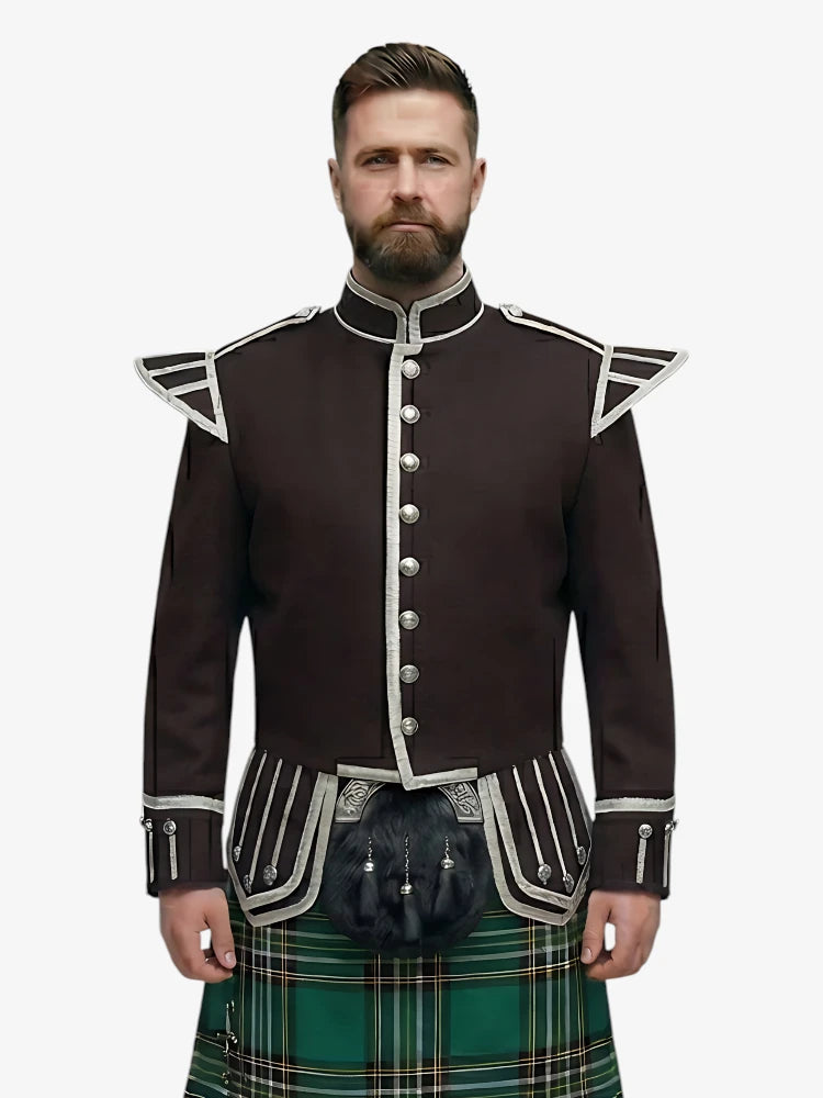 Man wearing a traditional Scottish irish national tartan kilt with a dark brown jacket on a white background