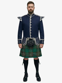 Man wearing a traditional Scottish irish national tartan kilt with a navy jacket on a white background
