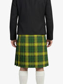 Person wearing a green plaid kilt with a black jacket on a white background