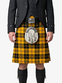Person wearing a yellow and black plaid kilt with a dark gray jacket and boots on a white background