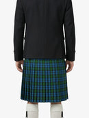 Person wearing a black jacket and green plaid kilt on a white background