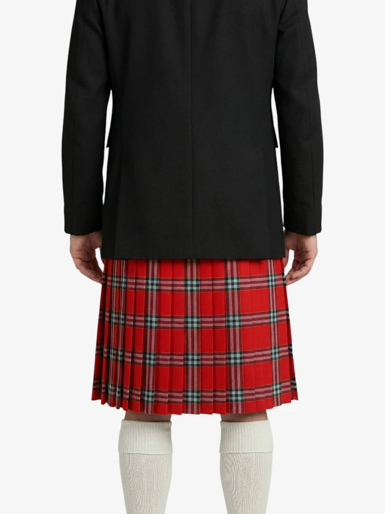 Person wearing a black coat and red plaid kilt on a white background