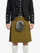 Person wearing a traditional Scottish kilt with a plaid pattern on a white background