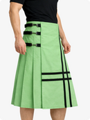 Light Green skirt with black straps and zippers worn by a person on a white background