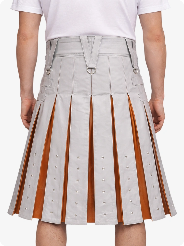 Person wearing a Light gray pleated skirt with brown stripes on a white background