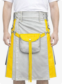 Person wearing a light gray and yellow kilt with visible buttons and fringes.