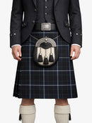 Person wearing a traditional Scottish kilt with a sporran on a white background