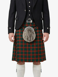 Person wearing a traditional Scottish kilt with a tartan pattern on a white background