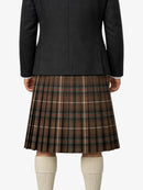 Person wearing a black jacket and plaid kilt on a white background
