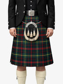 Person wearing a traditional Scottish kilt with a tartan pattern on a white background