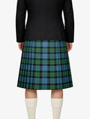 Person wearing a black jacket and green plaid kilt on a white background