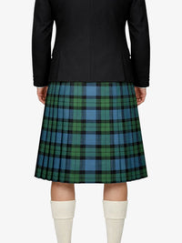Person wearing a black jacket and green plaid kilt on a white background