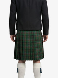 Person wearing a dark jacket and green plaid kilt on a white background