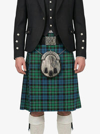 Person wearing a traditional Scottish kilt with a tartan pattern on a white background