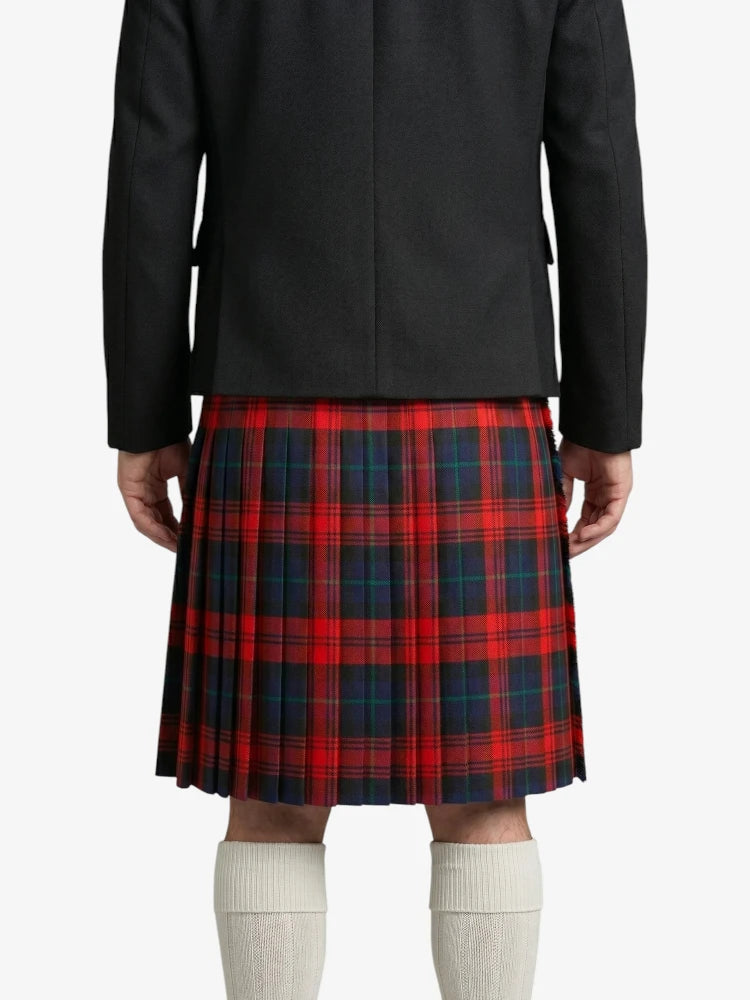 Person wearing a black jacket and red plaid kilt on a white background